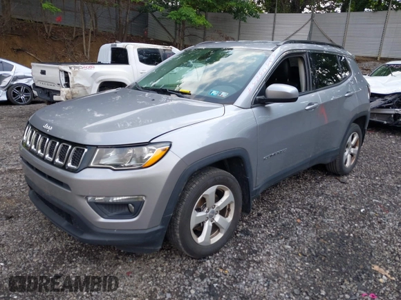 2018 Jeep Compass Latitude with VIN 3C4NJDBB8JT434339, listed as a IAAI auction lot 42404248 with 131,295 mi miles and . Bid and sale history available at DreamBid. Image 2.