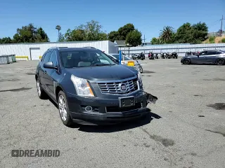 2014 Cadillac SRX Performance Collection z VIN 3GYFNCE36ES687267, wystawiony jako Copart lot #58242255 z przebiegiem 167 577 mil mil oraz Szkoda całkowita • Salvage title. Historia ofert i sprzedaży dostępna na DreamBid. Obrazek 14.