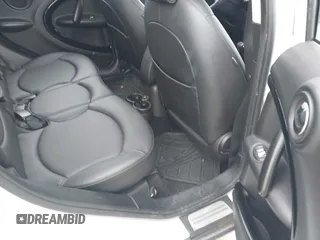 2014 MINI Countryman with VIN WMWZB3C5XEWR37594, listed as a IAAI auction lot 42500466 with 67,589 mi miles and . Bid and sale history available at DreamBid. Image 8.