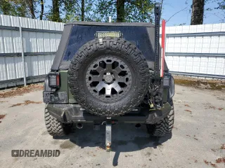 2008 Jeep Wrangler Unlimited Rubicon with VIN 1J4GA69148L591013, listed as a Copart auction lot 53931315 with 164,396 mi miles and Clean title. Bid and sale history available at DreamBid. Image 6.