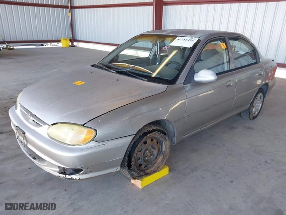 2000 Kia Spectra with VIN KNAFB121XY5905566, listed as a IAAI auction lot 41755491 with NaN miles. Bid and sale history available at carsss.com. Image 2.