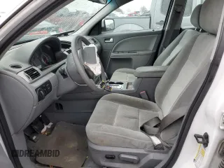 2006 Ford Five Hundred SE with VIN 1FAFP23176G135293, listed as a Copart auction lot 80738144 with 117,847 mi miles and Salvage Title. Bid and sale history available at carsss.com. Image 7.