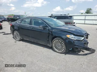 2017 Ford Fusion SE z VIN 3FA6P0H92HR150296, wystawiony jako Copart lot #57075385 z przebiegiem 135 304 mil mil oraz Szkoda całkowita • Salvage title. Historia ofert i sprzedaży dostępna na DreamBid. Obrazek 4.