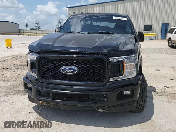 2018 Ford F-150 XL with VIN 1FTEW1E57JFC39493, listed as a Copart auction lot 61781395 with 129,871 mi miles and Salvage title. Bid and sale history available at DreamBid. Image 13.