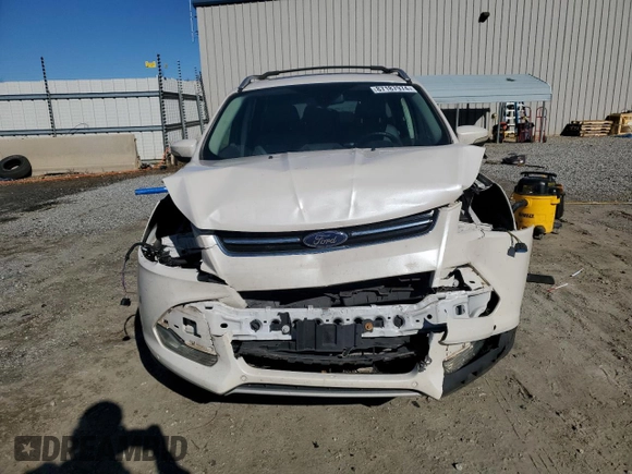 2013 Ford Escape Titanium с VIN 1FMCU0J96DUD67980, выставлен на аукционе Copart как лот 87187974 с пробегом 107 284 миль миль и Списание • Salvage title. История ставок и продаж доступна на DreamBid. Изображение 5.