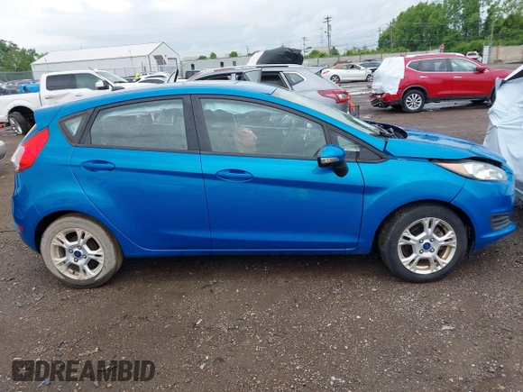 2015 Ford Fiesta SE z VIN 3FADP4EJ9FM133020, wystawiony jako IAAI lot #42302738 z przebiegiem 115 669 mil mil oraz . Historia ofert i sprzedaży dostępna na DreamBid. Obrazek 13.