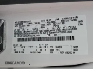2013 Ford Escape SE with VIN 1FMCU9G9XDUA92061, listed as a Copart auction lot 63074655 with 150,848 mi miles and Salvage title. Bid and sale history available at DreamBid. Image 13.