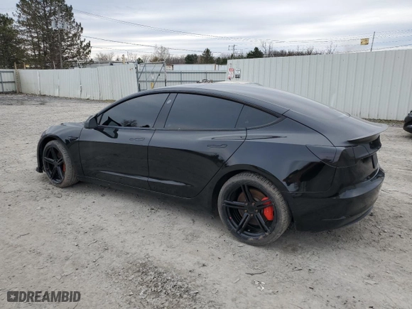 2021 Tesla Model 3 Performance with VIN 5YJ3E1EC7MF925440, listed as a Copart auction lot 52012485 with 77,386 mi miles and Salvage Title. Bid and sale history available at carsss.com. Image 2.