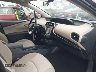 2016 Toyota Prius Four z VIN JTDKARFU4G3005103, wystawiony jako IAAI lot #41807171 z przebiegiem 127 105 mil mil oraz . Historia ofert i sprzedaży dostępna na DreamBid. Obrazek 5.