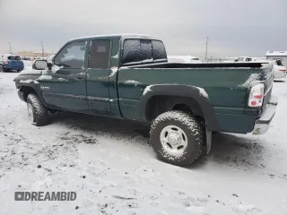 2000 Dodge Ram 2500 with VIN 1B7KF2369YJ151573, listed as a Copart auction lot 83984894 with 213,974 mi miles and Salvage Title. Bid and sale history available at carsss.com. Image 2.