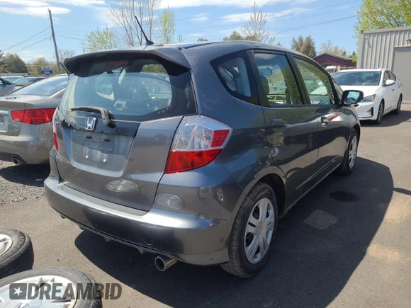 2011 Honda Fit Sport with VIN JHMGE8H50BC801106, listed as a Copart auction lot 56783675 with Not Provided miles and Clean Title. Bid and sale history available at DreamBid. Image 4.