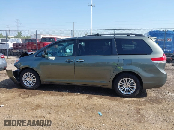 2014 Toyota Sienna XLE with VIN 5TDYK3DC6ES414892, listed as a IAAI auction lot 42545666 with 135,805 mi miles and . Bid and sale history available at DreamBid. Image 15.