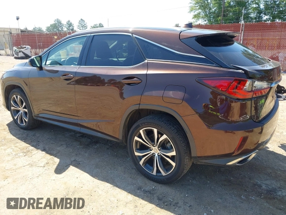 2016 Lexus RX 350 with VIN 2T2ZZMCA3GC005018, listed as a IAAI auction lot 42276197 with 136,692 mi miles and . Bid and sale history available at DreamBid. Image 3.