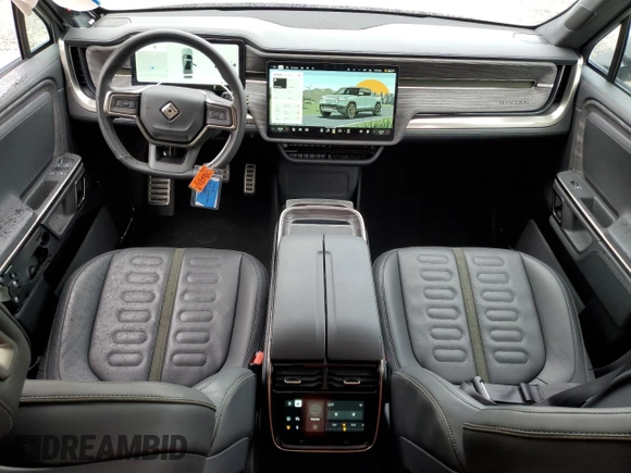 2022 Rivian R1T Launch Edition z VIN 7FCTGAALXNN004228, wystawiony jako Copart lot #43226985 z przebiegiem 4 mil mil oraz Szkody całkowita. Historia ofert i sprzedaży dostępna na DreamBid. Obrazek 8.