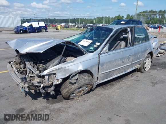 2001 Honda Accord EX z VIN 1HGCG16561A021742, wystawiony jako IAAI lot #42138513 z przebiegiem 217 113 mil mil oraz . Historia ofert i sprzedaży dostępna na DreamBid. Obrazek 2.
