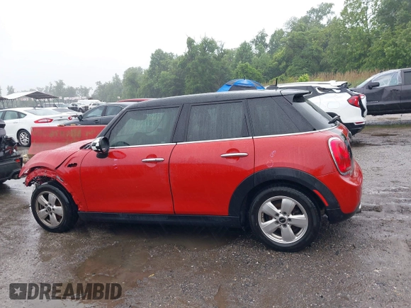 2017 MINI Hardtop 4 Door Cooper with VIN WMWXU1C58H2E18094, listed as a IAAI auction lot 42312473 with 50,482 mi miles and . Bid and sale history available at DreamBid. Image 15.