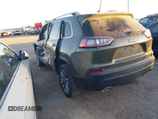 2019 Jeep Cherokee Latitude Plus with VIN 1C4PJLLN0KD164168, listed as a IAAI auction lot 41197248 with 118,278 mi miles and . Bid and sale history available at DreamBid. Image 3.