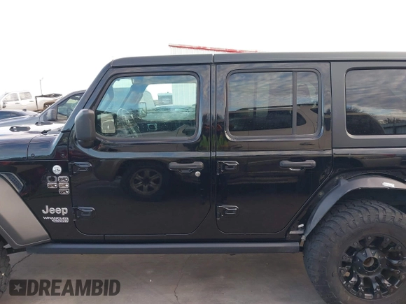 2019 Jeep Wrangler Unlimited Sport S with VIN 1C4HJXDN6KW686480, listed as a IAAI auction lot 41300842 with 67,359 mi miles and . Bid and sale history available at DreamBid. Image 14.