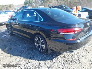 2020 Volkswagen Passat 2.0T SEL with VIN 1VWCA7A35LC012673, listed as a IAAI auction lot 41215951 with 100,095 mi miles. Bid and sale history available at carsss.com. Image 3.