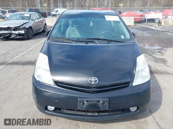 2005 Toyota Prius with VIN JTDKB20U253084443, listed as a IAAI auction lot 42024739 with 249,226 mi miles. Bid and sale history available at carsss.com. Image 6.