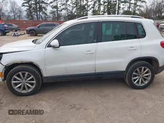 2017 Volkswagen Tiguan Wolfsburg Edition with VIN WVGRV7AX5HK019734, listed as a IAAI auction lot 41391911 with 123,005 mi miles and . Bid and sale history available at DreamBid. Image 14.