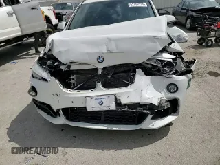 2016 BMW X1 xDrive28i z VIN WBXHT3C38GP888096, wystawiony jako Copart lot #52752255 z przebiegiem 115 084 mil mil oraz Szkoda całkowita • Salvage title. Historia ofert i sprzedaży dostępna na DreamBid. Obrazek 11.