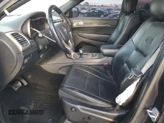 2014 Jeep Grand Cherokee Overland with VIN 1C4RJFCT4EC506790, listed as a Copart auction lot 47827675 with 163,511 mi miles and Salvage Title. Bid and sale history available at DreamBid. Image 7.
