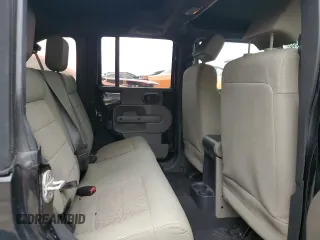 2008 Jeep Wrangler Unlimited Sahara with VIN 1J4GA59168L580525, listed as a Copart auction lot 47147905 with 223,138 mi miles and Salvage Title. Bid and sale history available at carsss.com. Image 11.
