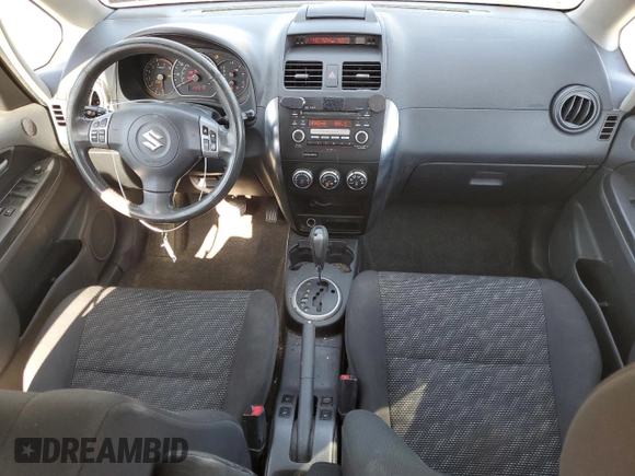 2009 Suzuki SX4 Man Touring Pkg AWD with VIN JS2YB417396202539, listed as a Copart auction lot 77067714 with 142,615 mi miles and Salvage Title. Bid and sale history available at carsss.com. Image 8.