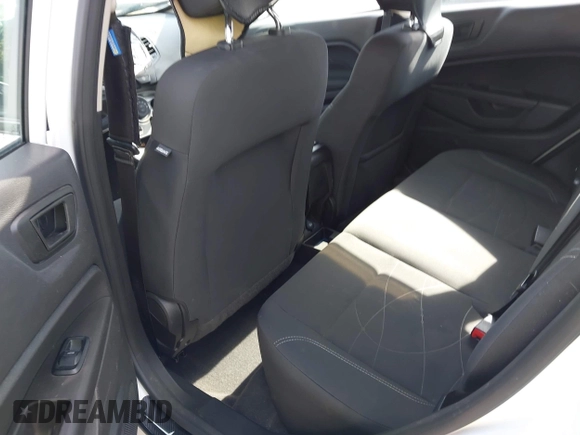 2018 Ford Fiesta SE z VIN 3FADP4EJXJM100407, wystawiony jako IAAI lot #42285374 z przebiegiem 90 261 mil mil oraz . Historia ofert i sprzedaży dostępna na DreamBid. Obrazek 8.