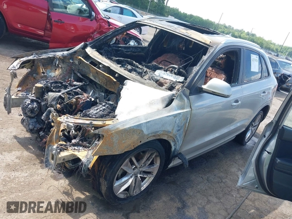 2017 Audi Q3 Premium with VIN WA1ECCFS2HR013647, listed as a IAAI auction lot 42376718 with Not provided miles and . Bid and sale history available at DreamBid. Image 2.