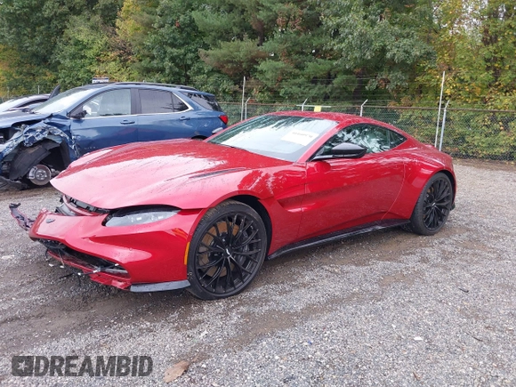 2023 Aston Martin Vantage z VIN SCFSMGAW8PGN08275, wystawiony jako IAAI lot #40460970 z przebiegiem 2 602 mil mil oraz . Historia ofert i sprzedaży dostępna na DreamBid. Obrazek 23.