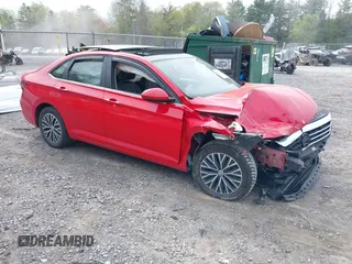 2019 Volkswagen Jetta S z VIN 3VWC57BU8KM172166, wystawiony jako IAAI lot #42257866 z przebiegiem 74 820 mil mil oraz . Historia ofert i sprzedaży dostępna na DreamBid. Obrazek 1.