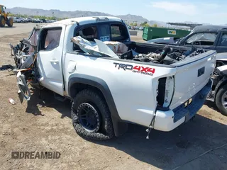2020 Toyota Tacoma SR5 with VIN 3TMCZ5ANXLM297886, listed as a IAAI auction lot 41965591 with Not provided miles and . Bid and sale history available at DreamBid. Image 3.