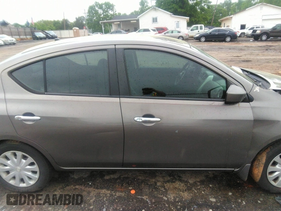 2015 Nissan Versa SV with VIN 3N1CN7AP7FL869485, listed as a IAAI auction lot 42077524 with 198,646 mi miles. Bid and sale history available at carsss.com. Image 13.