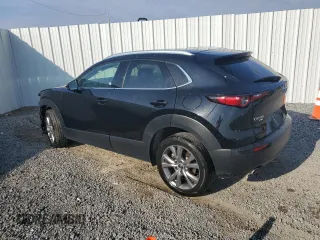 2023 Mazda CX-30 S Premium with VIN 3MVDMBDM8PM527420, listed as a Copart auction lot 44121945 with 29,659 mi miles and Salvage Title. Bid and sale history available at DreamBid. Image 2.