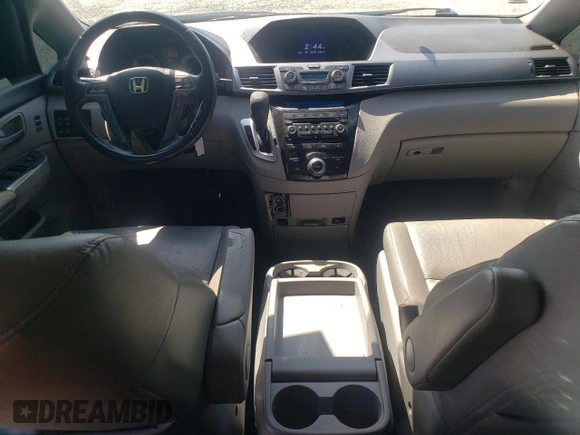 2012 Honda Odyssey Touring with VIN 5FNRL5H94CB009952, listed as a Copart auction lot 54322695 with 135,551 mi miles and Salvage title. Bid and sale history available at DreamBid. Image 8.