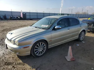 2006 Jaguar X-Type with VIN SAJWA51A06WE76108, listed as a Copart auction lot 82341904 with 128,320 mi miles and Salvage Title. Bid and sale history available at DreamBid. Image 1.