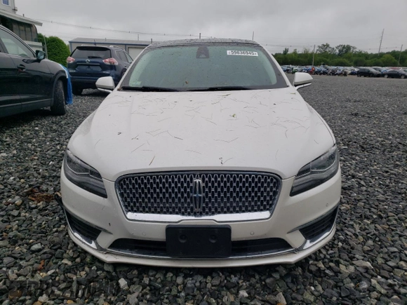 2018 Lincoln MKZ с VIN 3LN6L5G9XJR611248, выставлен на аукционе Copart как лот 59836945 с пробегом 62 773 миль миль и Списание • Salvage title. История ставок и продаж доступна на DreamBid. Изображение 5.