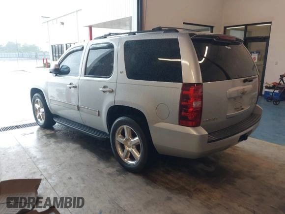 2010 Chevrolet Tahoe LT with VIN 1GNMCBE35AR114622, listed as a IAAI auction lot 41974795 with 248,109 mi miles and . Bid and sale history available at DreamBid. Image 3.