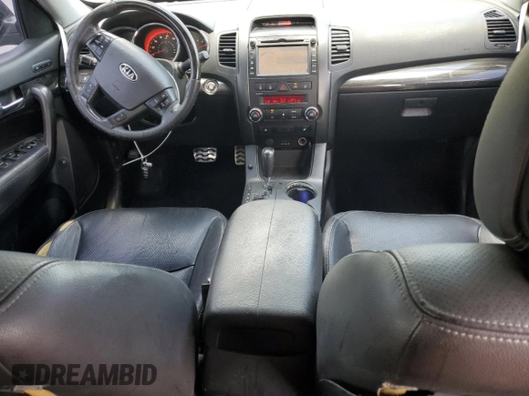 2012 Kia Sorento SX with VIN 5XYKW4A29CG308152, listed as a Copart auction lot 64895355 with 126,816 mi miles and Salvage title. Bid and sale history available at DreamBid. Image 8.