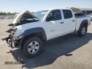 2014 Toyota Tacoma с VIN 3TMMU4FN3EM064053, выставлен на аукционе Copart как лот 62381885 с пробегом 180 307 миль миль и Списание • Salvage title. История ставок и продаж доступна на DreamBid. Изображение 1.