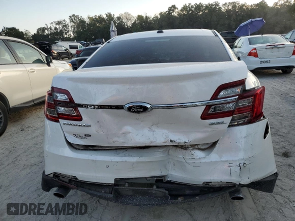 2019 Ford Taurus SEL with VIN 1FAHP2E82KG114879, listed as a Copart auction lot 80266574 with 75,561 mi miles and Salvage Title. Bid and sale history available at DreamBid. Image 6.