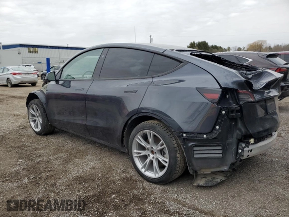 2024 Tesla Model Y Long Range with VIN 7SAYGAEE6RF070354, listed as a Copart auction lot 49826975 with Not Provided miles and Clean Title. Bid and sale history available at DreamBid. Image 2.