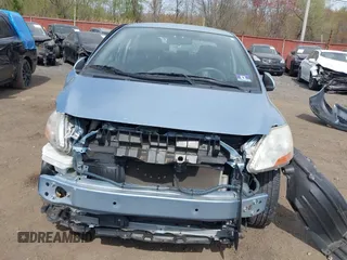 2009 Toyota Yaris with VIN JTDBT903891336792, listed as a IAAI auction lot 42096543 with 115,735 mi miles and . Bid and sale history available at DreamBid. Image 12.