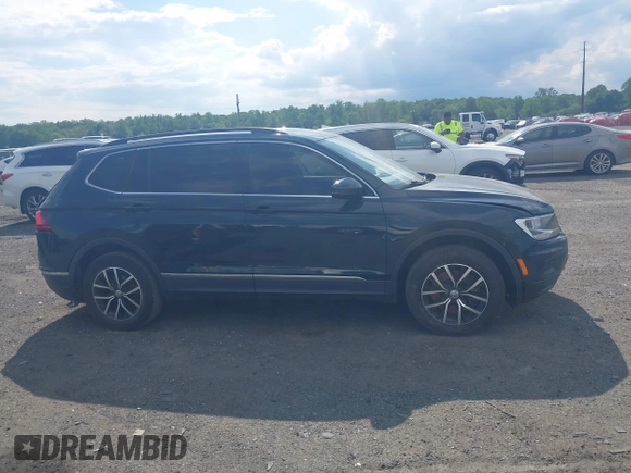 2018 Volkswagen Tiguan SEL z VIN 3VV2B7AX0JM047200, wystawiony jako IAAI lot #42221523 z przebiegiem 108 753 mil mil oraz . Historia ofert i sprzedaży dostępna na DreamBid. Obrazek 13.