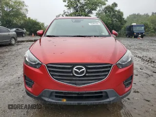 2016 Mazda CX-5 Grand Touring with VIN JM3KE4DY3G0713283, listed as a Copart auction lot 73346194 with 135,382 mi miles and Salvage Title. Bid and sale history available at carsss.com. Image 5.