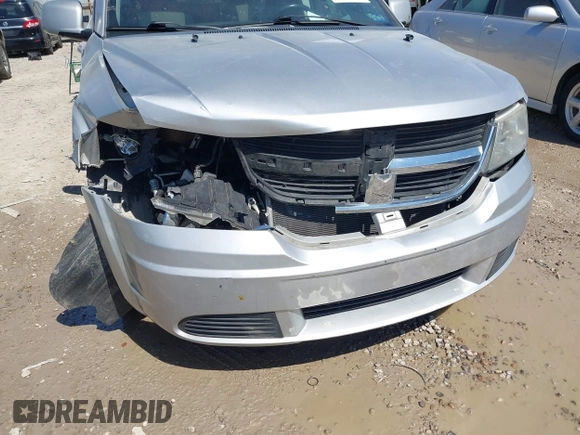 2009 Dodge Journey SXT with VIN 3D4GG57V19T138643, listed as a IAAI auction lot 41901454 with 150,576 mi miles. Bid and sale history available at carsss.com. Image 6.