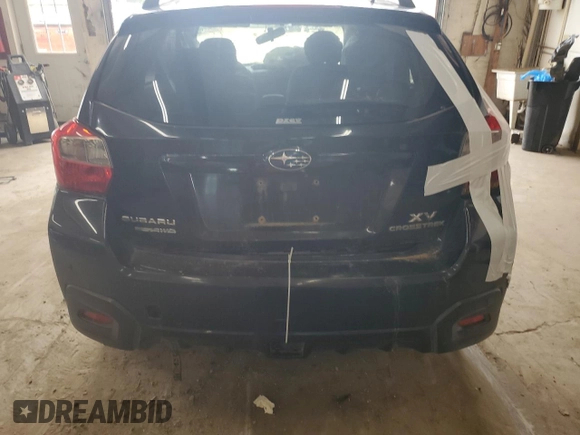 2014 Subaru Crosstrek Premium with VIN JF2GPACC2E9203210, listed as a Copart auction lot 61435825 with 228,500 mi miles and Salvage title. Bid and sale history available at DreamBid. Image 6.