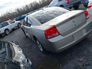 2009 Dodge Charger SXT with VIN 2B3KA33V39H573726, listed as a IAAI auction lot 41491465 with 73,867 mi miles and . Bid and sale history available at carsss.com. Image 3.